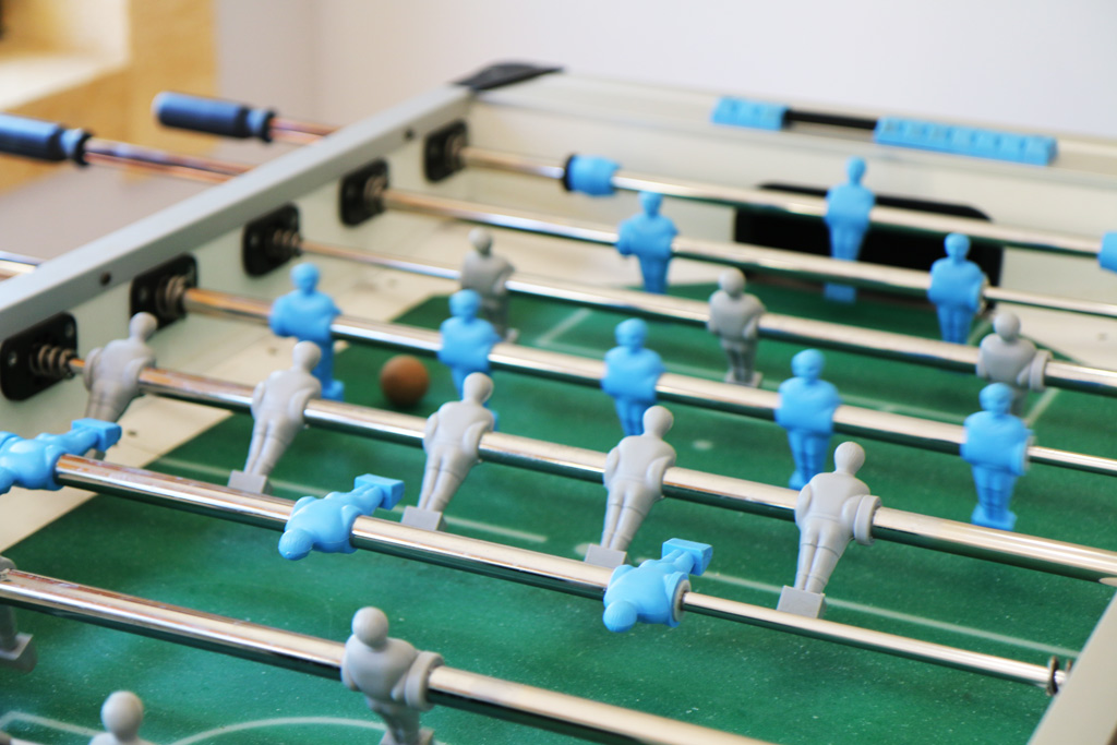 There are two 2 fooseball tables for crazy party games