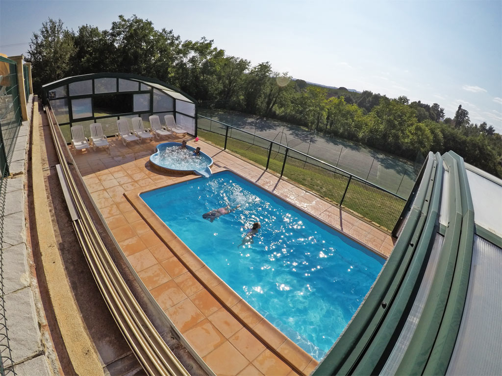 The covered pool (which can also be uncovered!