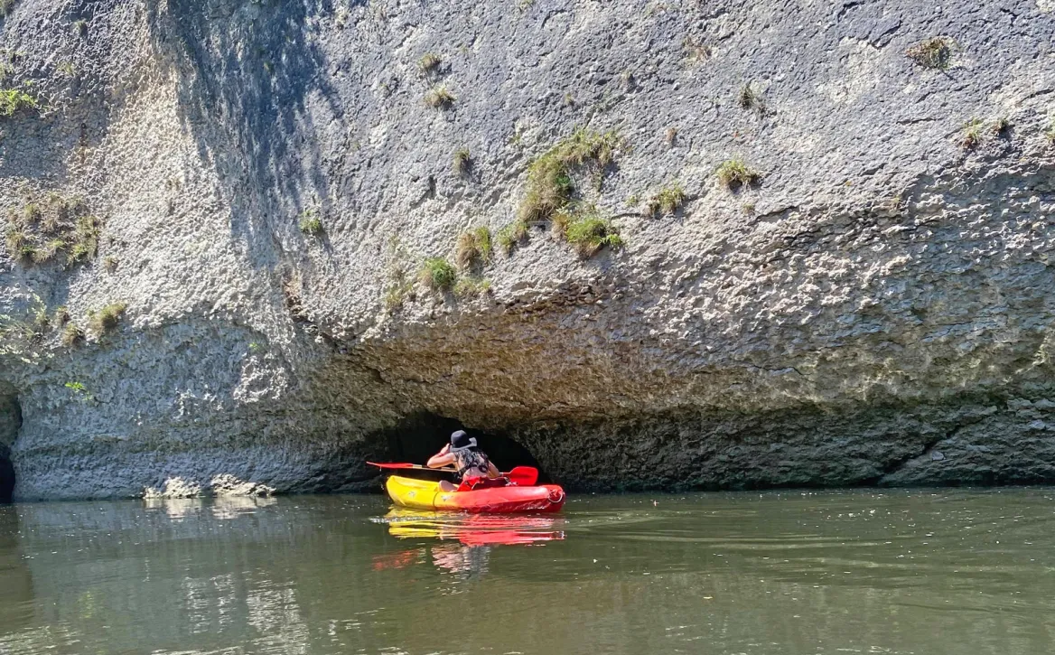 Under the rocks in a canoe