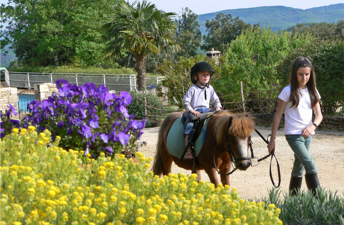 pony ride in the hamlet the path of the sources